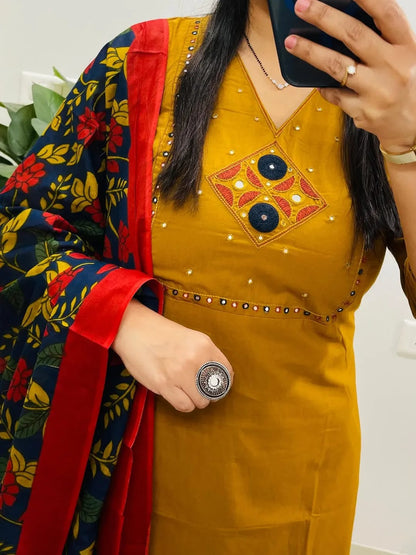 Women's Mustard Dhabu Cotton Embroidered Kurta Pant Set with Floral Printed Dupatta | Mirror Work Ethnic Suit